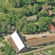 Flyfoto av byggene og tunet på Tveten gård